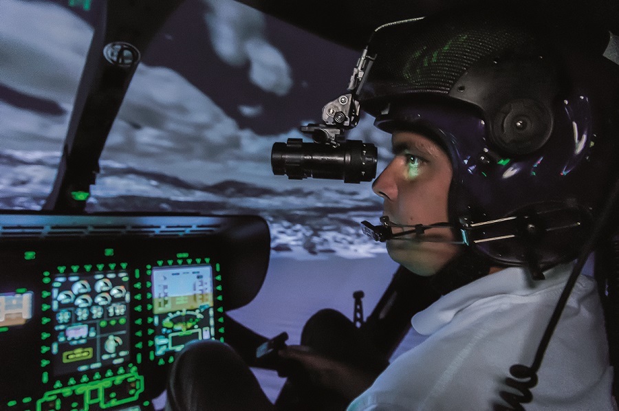 Cockpit of a helicopter full flight simulator of the type H145 with use of a night vision device (Credit Reiser Simulation and Training)