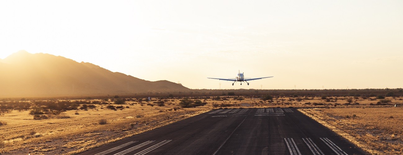 A training aircraft is just taking off.